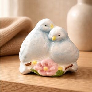 Avon Ceramic Figurine with Gold and Blue Accents Napkin Rings set of 8